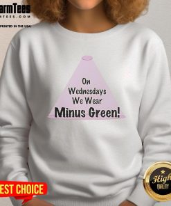 Good on Wednesdays We Wear Minus Green sweatshirt displayed on a hanger, showcasing its stylish design and cozy fabric.