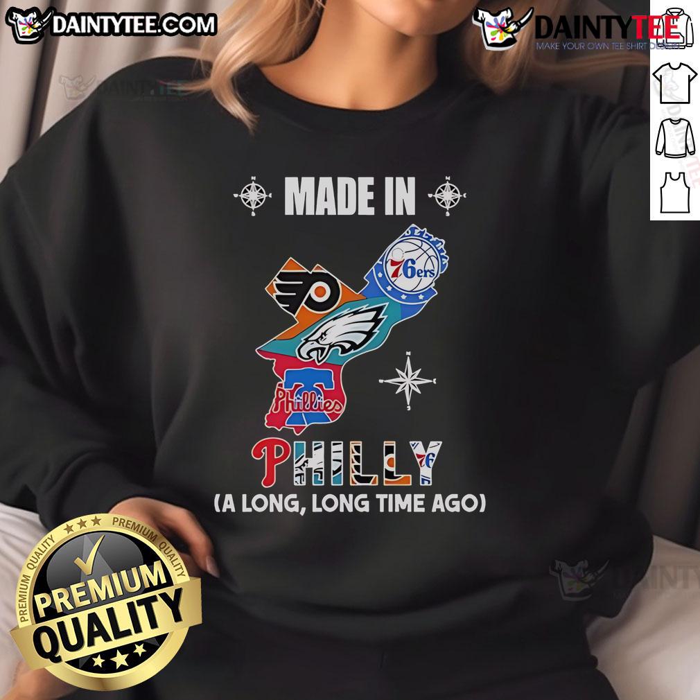 Good Phillies Eagles 76ers Flyers Made In Philly A Long And Long Time Ago Logos In Map Sweatshirt Alt Text: Vintage sweatshirt featuring logos of Phillies, Eagles, 76ers, and Flyers in a map design, celebrating Philly sports history.