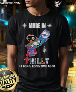 Vintage 'Made In Philly' t-shirt featuring logos of Phillies, Eagles, 76ers, and Flyers on a map design.