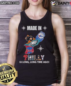 Tank top featuring vintage logos of Phillies, Eagles, 76ers, and Flyers, celebrating Philadelphia sports heritage.