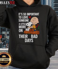 Good Snoopy hoodie with 'Love Someone More on Bad Days' design, perfect for cozy comfort and uplifting messages.