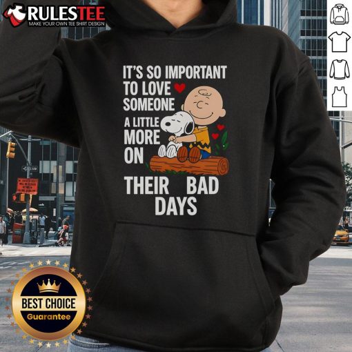 Good Snoopy hoodie with 'Love Someone More on Bad Days' design, perfect for cozy comfort and uplifting messages.