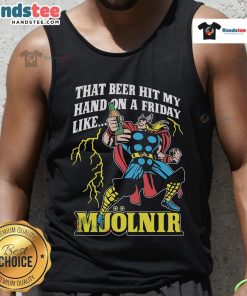 Man wearing 'Good That Beer Hit My Hand On A Friday Like Mjolnir' tank top, enjoying a sunny day outdoors with friends.