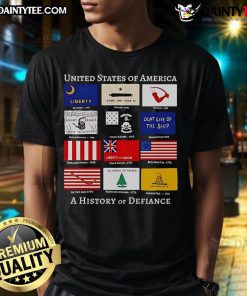 Good United States Of America A History Of Defiance Flags T-Shirt featuring bold flag graphics and patriotic design.