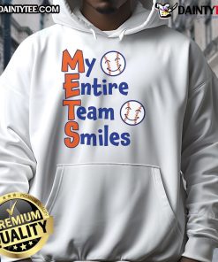Happy Mets team members wearing baseball hoodies, all smiling together in a joyful celebration.