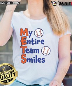 Happy Mets team smiles together in baseball ladies tee, showcasing team spirit and camaraderie on the field.