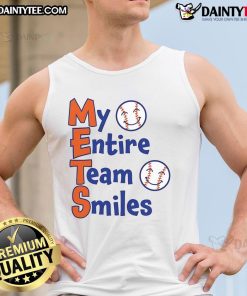 Alt Text: Happy Mets team smiles in baseball tank tops, showcasing team spirit and camaraderie on the field.
