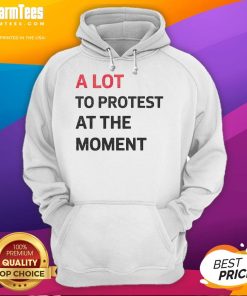 Stylish 'Hot A Lot To Protest At The Moment' hoodie displayed on a mannequin, perfect for activism and casual wear.