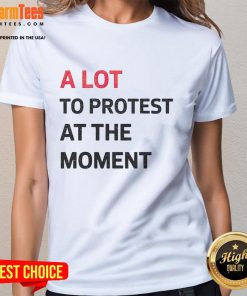 Hot-A-Lot-To-Protest-At-The-Moment ladies tee featuring a bold protest slogan in vibrant colors.