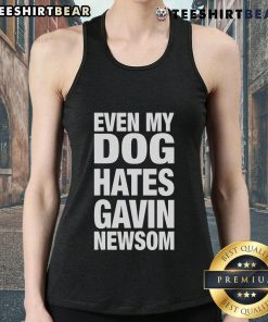Person wearing a 'Hot Even My Dog Hates Gavin Newsom' tank top, showcasing a humorous take on California politics.