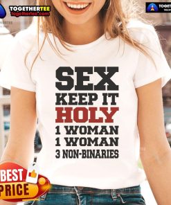 Hot Rebecca Black wearing a 'Keep It Holy' tee, surrounded by women and non-binaries, showcasing inclusive fashion.