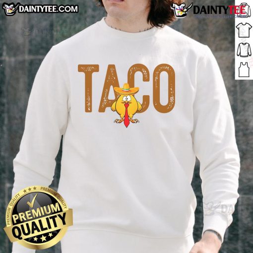 Funny sweatshirt featuring 'Hot Taco Trump Always Chickens Out' graphic, perfect for humor and political satire lovers.
