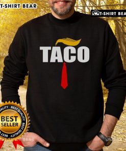 Hot Taco Trump Hair Tie Sweatshirt featuring a vibrant taco design and fun Trump-inspired graphics.
