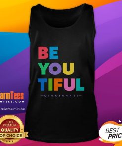 Stylish Nice Beyoutiful Cincinnati tank top displayed on a wooden background, perfect for casual summer outfits.