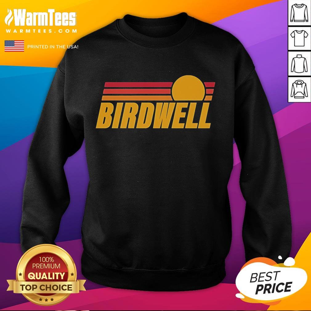 Nice Birdwell Sundowner Sweatshirt Alt Text: Cozy Nice Birdwell Sundowner Sweatshirt displayed on a hanger, featuring a stylish design perfect for casual wear.