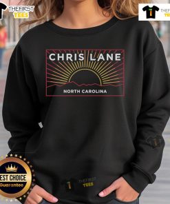 Cozy Nice Chris Lane North Carolina sunset sweatshirt displayed against a vibrant sunset backdrop, perfect for fans.