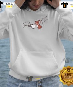 Cozy Wituka hoodie featuring a stylish design, perfect for enjoying a nice coffee on a cool day.