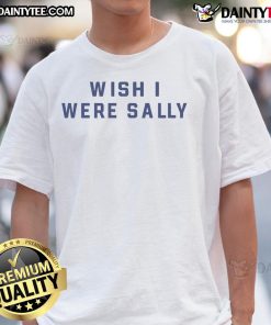 Alt Text: Conan Gray wearing a 'Wish I Were Sally' T-shirt, showcasing his stylish look and unique fashion sense.