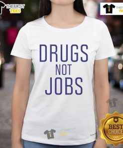 Womens tee featuring 'Nice Drugs Not Jobs' slogan, perfect for casual wear and expressing a bold lifestyle choice.