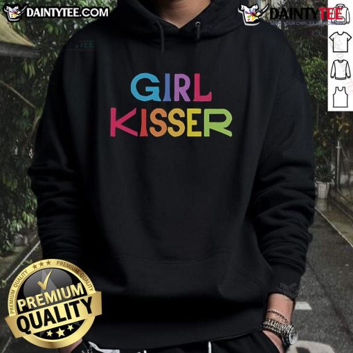 Girl in a red hoodie with a kiss design, showcasing trendy street style in a vibrant urban setting.