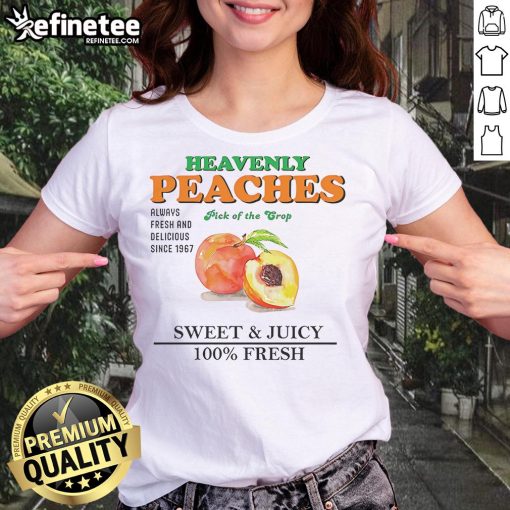 Sweet and juicy Nice Heavenly peaches on a fresh ladies tee, showcasing the crop's vibrant colors and freshness.