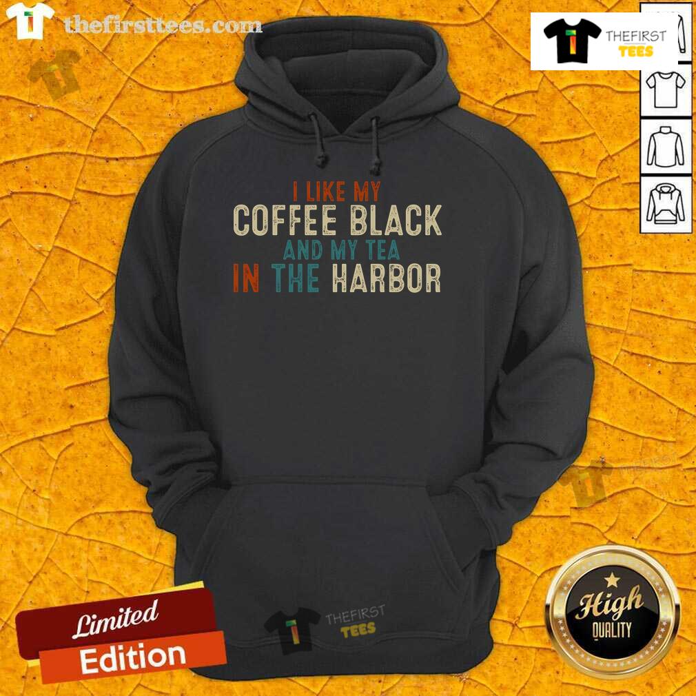 Nice I Like Coffee Black And My Tea In The Harbor Vintage Hoodie Vintage hoodie reading 'I Like Coffee Black and My Tea in the Harbor' displayed against a cozy cafe backdrop.