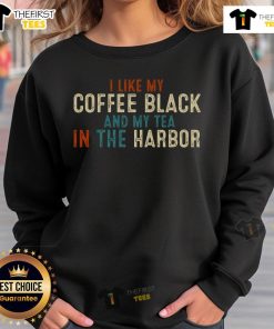 Vintage sweatshirt featuring 'I like coffee black and my tea in the harbor' design, perfect for coffee and tea lovers.
