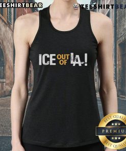 Protester wearing an 'Anti-ICE' tank top at a Los Angeles immigration protest against ICE policies in the USA.