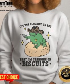 Trendy 'Nice, It's Not Clocking to You That I'm Standing on Biscuits' sweatshirt displayed on a model in a stylish setting.