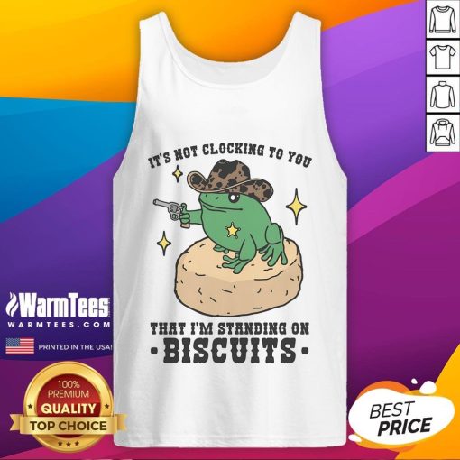 Model wearing 'Nice It's Not Clocking To You That I'm Standing On Biscuits' tank top, showcasing a trendy, humorous design.