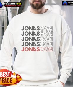 Jonas Brothers Jonascon sweatshirt featuring a stylish repetitive design, perfect for fans and casual wear.