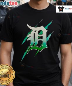 Alt Text: Jurassic World Rebirth Detroit Tigers logo t-shirt featuring a bold design and vibrant colors, perfect for fans.