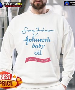 Sean Johnson wearing a stylish Johnson's Baby Oil sweatshirt, showcasing a trendy and comfortable fashion choice.