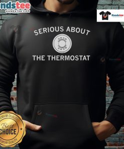 Person wearing a Nice Serious About The Thermostat hoodie, showcasing cozy style and warmth in a casual setting.