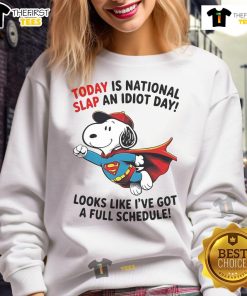 Cozy sweatshirt featuring Snoopy as Superman for National Slap An Idiot Day, perfect for a fun and humorous look.