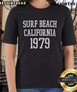 1979 California surf beach scene featuring ladies in stylish tees enjoying the sun and waves.