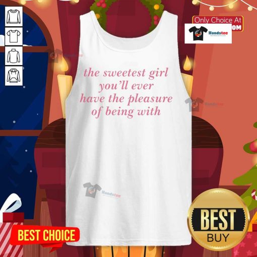 Woman wearing 'Nice: The Sweetest Girl You'll Ever Have' tank top, smiling in a sunny outdoor setting.