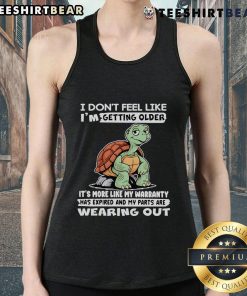 Funny tank top featuring a turtle and the phrase about aging and expired warranty, perfect for humor lovers.
