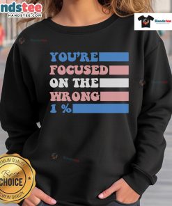 Stylish 'You're Focused on the Wrong 1 Percent' sweatshirt, perfect for motivational wear and casual outfits.