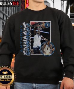 Alt Text: Official Anthony Edwards navy Minnesota Timberwolves 90s player sweatshirt featuring vintage design and logo.