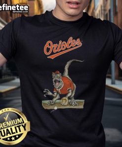 Alt Text: Official Baltimore Orioles Tiny Turnip Velociraptor T-Shirt featuring a fun dinosaur design for young fans.