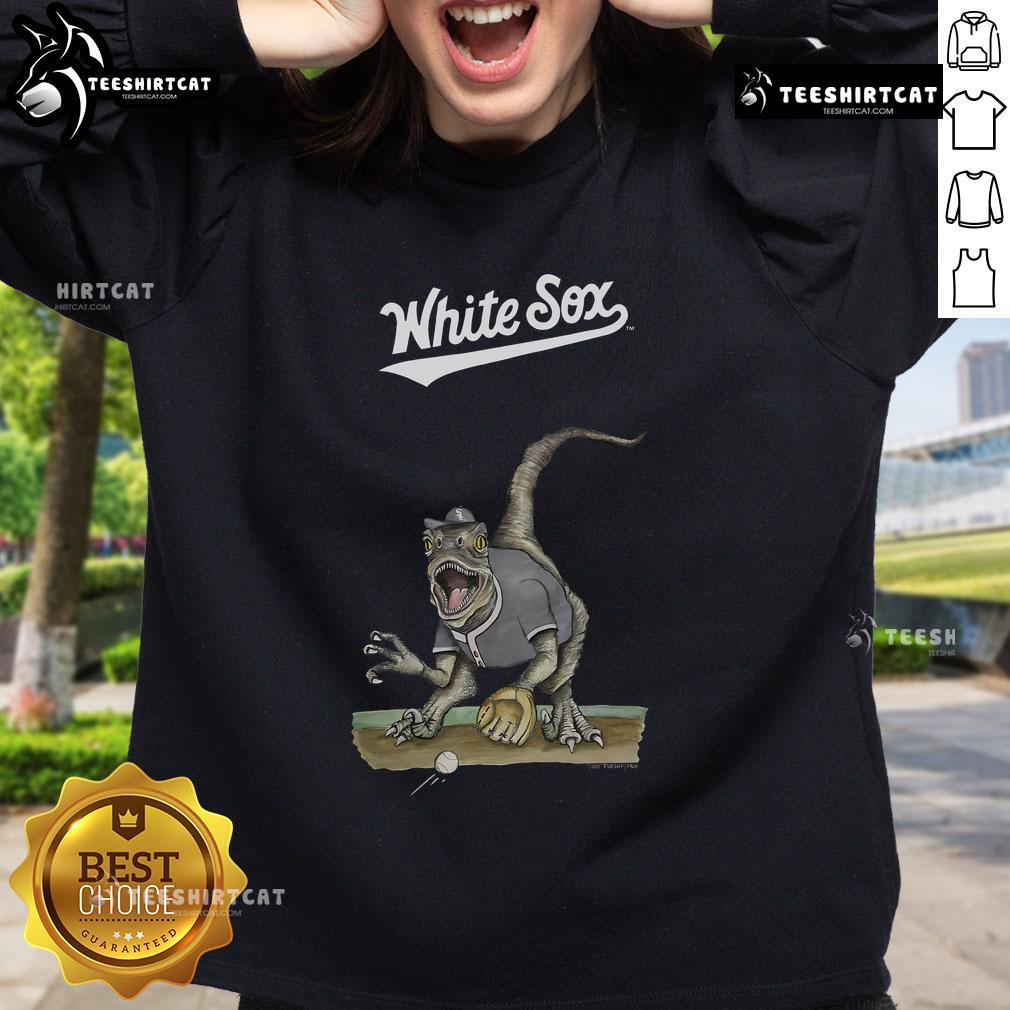 Official Chicago White Sox Tiny Turnip Velociraptor Sweatshirt Official Chicago White Sox Tiny Turnip Velociraptor Sweatshirt featuring a playful dinosaur design, perfect for fans.