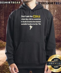 Official hoodie featuring 'Don't Ask The CIA' slogan about U.S. interventions in South America and socialist leaders.