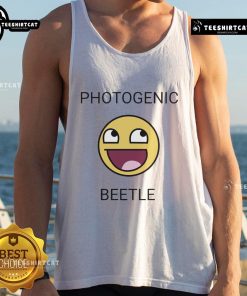 Photogenic beetle wearing an official face smiley meme tank top, showcasing a fun and quirky fashion statement.