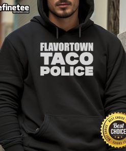 Alt Text: Guy Fieri wearing an Official Flavortown Taco hoodie, showcasing vibrant colors and a fun food-themed design.