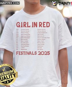Alt Text: Official girl kissing another girl, both wearing casual outfits, with the girl in a red t-shirt smiling joyfully.