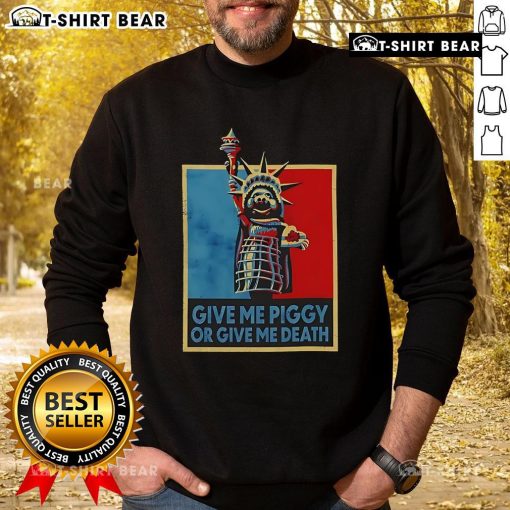 Alt Text: Official Give Me Piggy or Give Me Death Sweatshirt featuring bold text design in a stylish, comfortable fit.