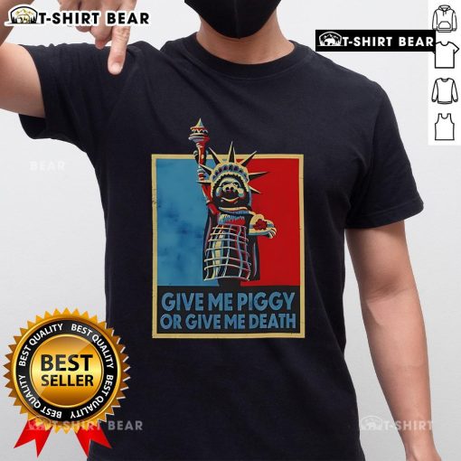 Official Give Me Piggy Or Give Me Death T-Shirt featuring playful graphics and bold text, perfect for pig lovers.