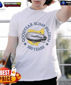 Alt Text: Official Goodyear Blimp Pilgrim 100 Years T-Shirt featuring a vintage design celebrating a century of aviation history.