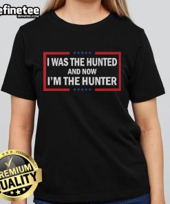 Official 'I Was The Hunted And Now I'm The Hunter' Ladies Tee featuring bold text and stylish design, perfect for hunters.
